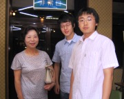 Mr. Lee and Mr. You with their Host family